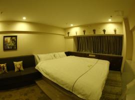 รูปภาพของโรงแรม: Yubeiqu Liting Hotel