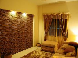 รูปภาพของโรงแรม: Rajanigandha Family Suites