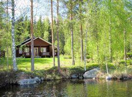 Foto di Hotel: Ferienhaus Saimaa Seenplatte 066S