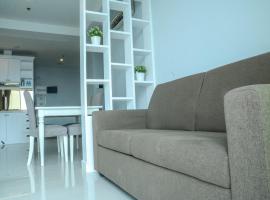 Hotel Photo: 2 BR Gallery West Apartment Near MACAN Museum By Travelio