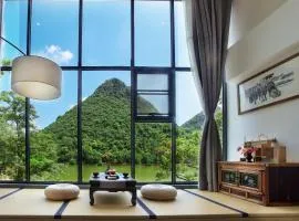 Guilin HeShe Lakeside Resort-Free pick up train station stay two nights