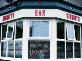 होटल की एक तस्वीर: Sinnotts Bar