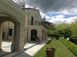 A picture of the hotel: Spacious villa with garden and panoramic views in the green hinterland of Rimini