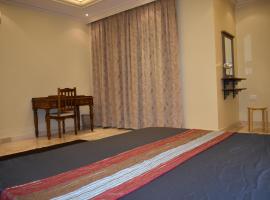 รูปภาพของโรงแรม: Muscat Villa Bedroom