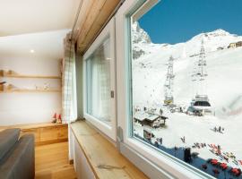รูปภาพของโรงแรม: HelloChalet - Maison Rêve Blanc - Ski to door with Matterhorn view