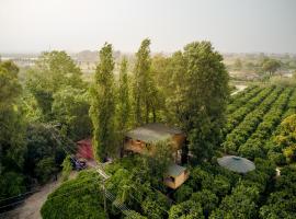 होटल की एक तस्वीर: Orangia Ecohosting Farm