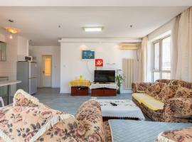 Dalian Xiuzhu Mansion Apartment, hotel v destinaci Dalian