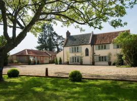 Holly Lodge Boutique B&B, Hotel in Thursford