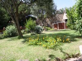 Stintino casa con giardino vicino la Pelosa、スティンティーノのホテル