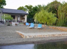 รูปภาพของโรงแรม: Lake House Sand