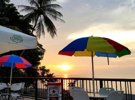รูปภาพของโรงแรม: Lauhata Beach Escape