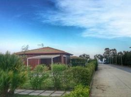 Foto di Hotel: Bungalow in riva al mare