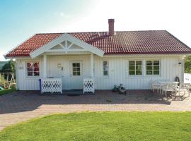 酒店照片: Two-Bedroom Holiday home with a Fireplace in Brårud