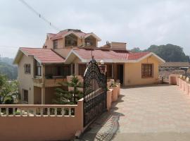 Rainbow Cottages-Budget Friendly rooms、ウーティのホテル