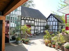 Hotel fotoğraf: Ferienhaus im Fachwerkhof 'Haus in Bewegung'