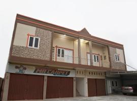 RedDoorz Syariah near Sultan Syarif Kasim II Airport, khách sạn ở Pekanbaru