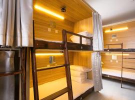 A picture of the hotel: Harbin Riceshop Youth Hostel,