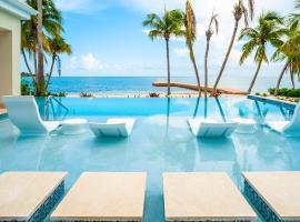 รูปภาพของโรงแรม: Kaibo Beach Paradise Villa 5 Bedrooms - Cayman Island Bay