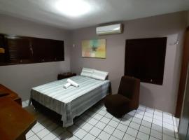 होटल की एक तस्वीर: Residência Familiar ARENA Quartos e Suítes
