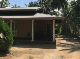 A picture of the hotel: Calm village paddy reach home