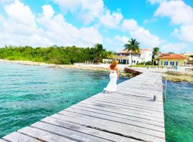 होटल की एक तस्वीर: The Queen of Cozumel Beach House -Luxury Beachfront Villa- MILLION DOLLARS VIEW