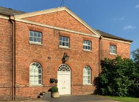 Hotel Foto: The Stables Apartment