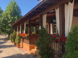 Pensiune Montana, hotel in Curtea de Argeş