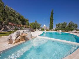 A picture of the hotel: Trulli&Dimore - Trulli di Bouganville