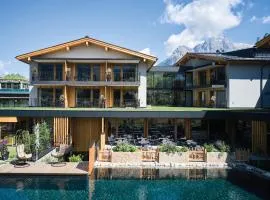 Wellness und Brunch Hotel MorgenZeit beheizter Naturteich Genuss Frühstück bis 13 Uhr Hochkönig Sommercard