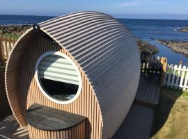 Photo de l’hôtel: Door to the Shore - Seafront Cottages