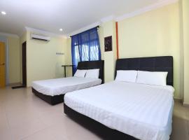 A picture of the hotel: SPOT ON 89857 Azra Inn (rumah Tumpangan)