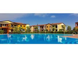 A picture of the hotel: Splendido appartamento nel Villaggio Riva Azzurra (wifi incluso)