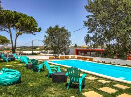 Hotel fotoğraf: 2 bedrooms house with shared pool enclosed garden and wifi at Atalaia 3 km away from the beach