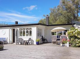 Foto di Hotel: 8 person holiday home in FAGERFJ LL R NN NG