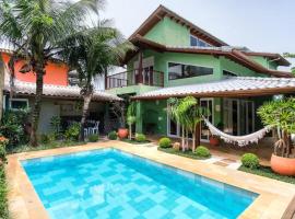 CHARMOSA CASA EM CONDO A 01 QUADRA DA PRAIA DO SAPE UBATUBA com churrasqueira, forno pizza, wifi, hotel in Ubatuba