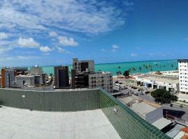 Foto di Hotel: APT QUARTO E SALA DE 42M², DECORADO E PLANEJADO A 50M DO MAR DA JATIÚCA MACEIÓ