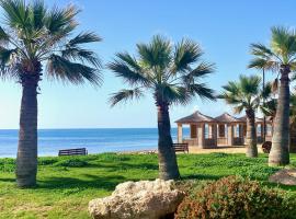 Peaceful Suites by the Sea, hotel a Vokolidha