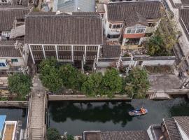 Suzhou Jade Snow Lodge, hotel v destinaci Su-čou