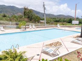 Fotos de Hotel: Apartment in Villas Del Faro Resort with WIFI