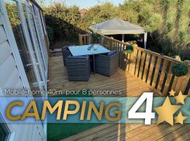 รูปภาพของโรงแรม: Mobil-Home 8 pers (climatisé), Lac des rêves