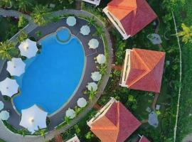 Swosti Chilika Resort, hotel v destinaci Kānāipur