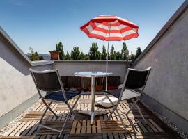 酒店照片: Andreas' Dachwohnung mit Terrasse