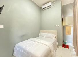 รูปภาพของโรงแรม: Pelangi Guest House Palembang RedPartner