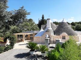 होटल की एक तस्वीर: TRULLI ASIA