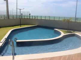 酒店照片: Loft encantador à beira-mar com piscina