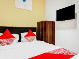 รูปภาพของโรงแรม: Super OYO 90692 Point Hostel