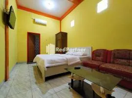 Hotel Hing Amimah Mitra RedDoorz, hotel u gradu Baubau