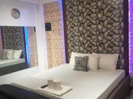 Gambaran Hotel: DJCI Apartelle With own kitchen & Bath 106-212