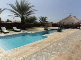 Posada Paraiso โรงแรมในเอล ยาค