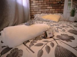 Hotel foto: Lovely 1-bedroom Garden Cottage